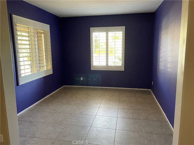 view of tiled spare room