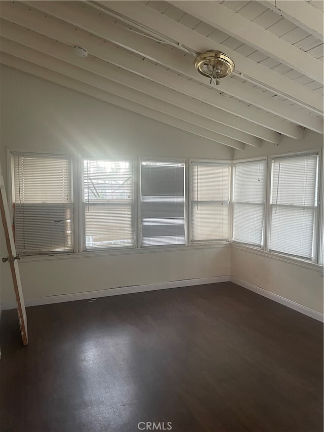 unfurnished sunroom with lofted ceiling with beams and wood ceiling