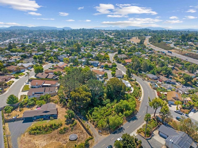 drone / aerial view featuring a mountain view