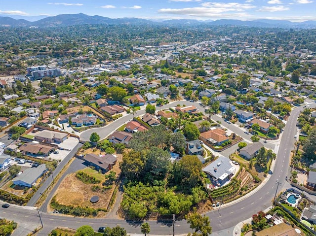 birds eye view of property featuring a mountain view