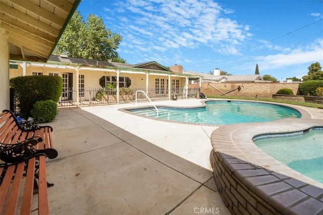 view of pool with a patio