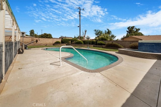 view of pool with a patio