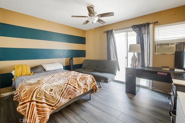 bedroom with wood-type flooring and ceiling fan