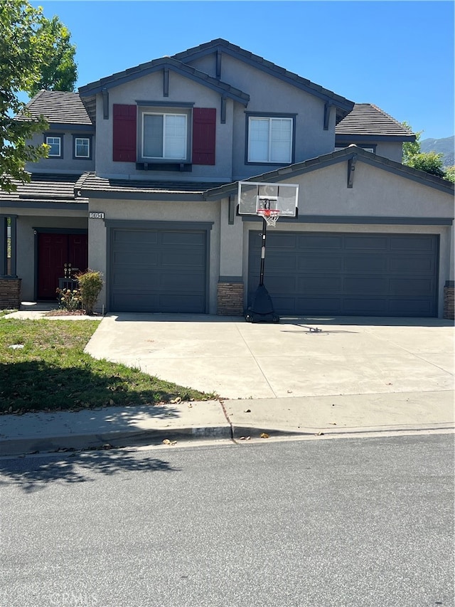 front of property featuring a garage