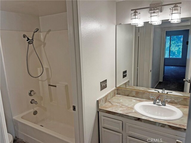 full bathroom with shower / bathtub combination, vanity, and toilet