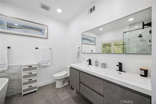 full bathroom with vanity, separate shower and tub, and toilet