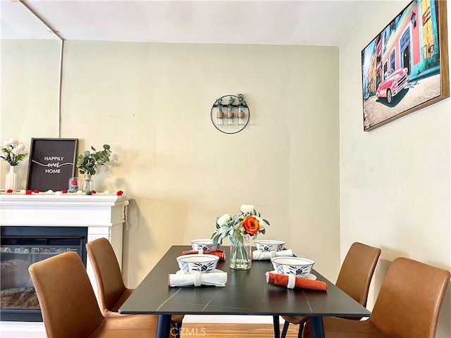 dining room with hardwood / wood-style floors