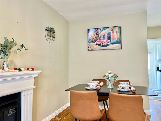 dining area featuring hardwood / wood-style floors