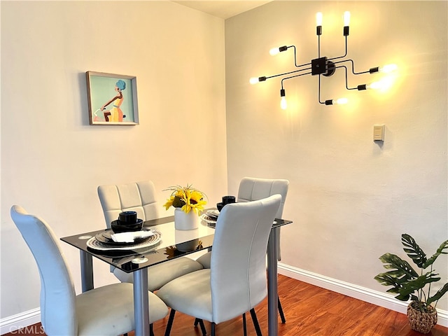 dining area featuring hardwood / wood-style floors