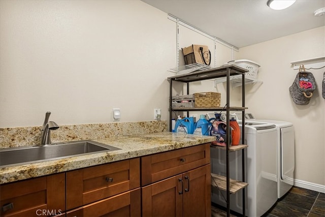 washroom featuring sink and washing machine and dryer