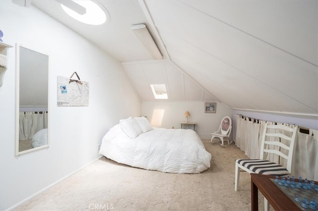 bedroom featuring carpet floors and vaulted ceiling