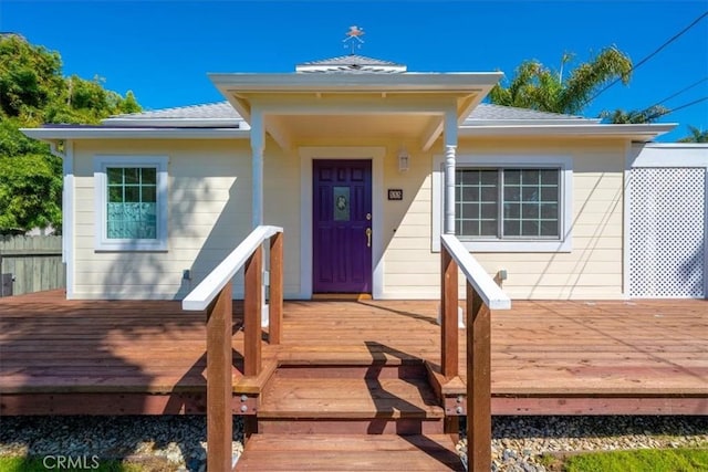 555 Le Point St, Arroyo Grande, CA 93420 - view of exterior entry featuring roof with shingles and a wooden deck