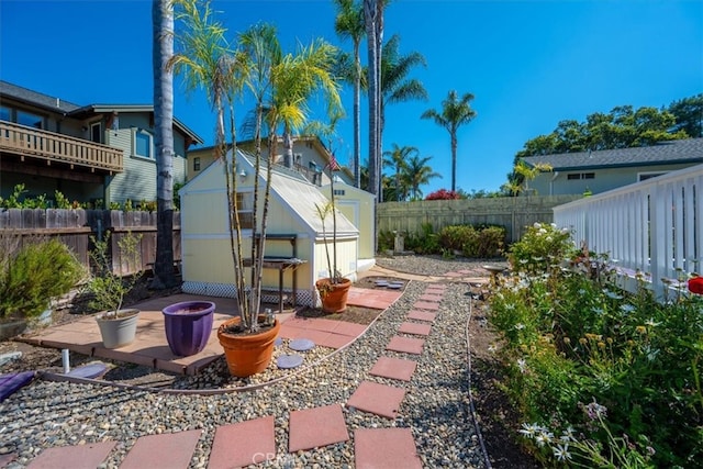 view of patio / terrace with a storage unit