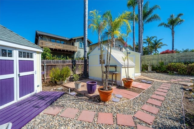 view of patio featuring a storage shed