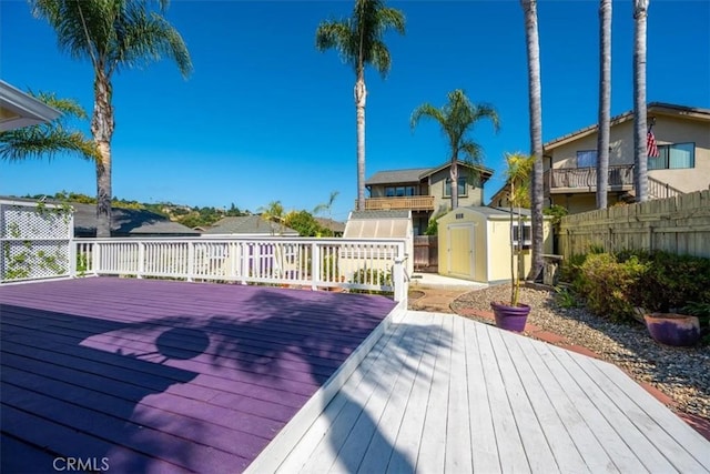 555 Le Point St, Arroyo Grande, CA 93420 - deck featuring a storage unit, an outdoor structure, fence, and a residential view
