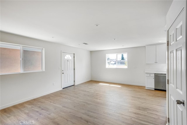 entrance foyer featuring light hardwood / wood-style flooring