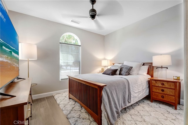 bedroom featuring ceiling fan and light wood-type flooring