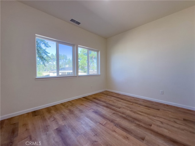 empty room featuring light hardwood / wood-style floors