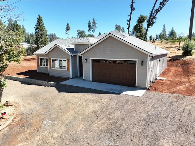 single story home with a garage