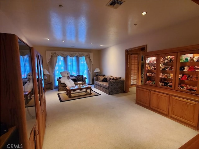 living room featuring light colored carpet