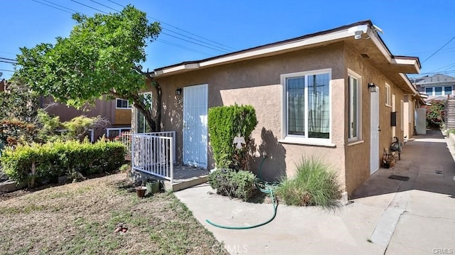 view of property exterior featuring a patio