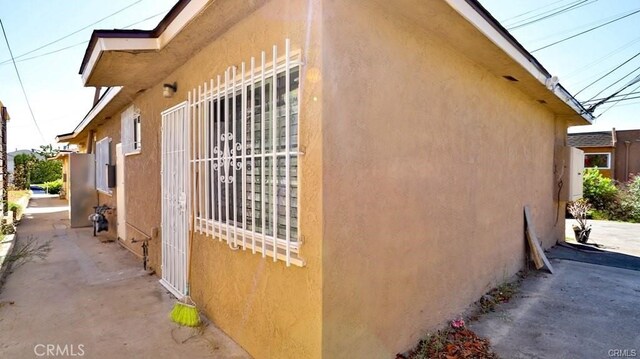 view of home's exterior with a patio area