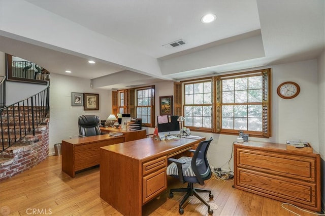 office with light hardwood / wood-style flooring