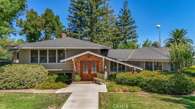 split level home with a front yard