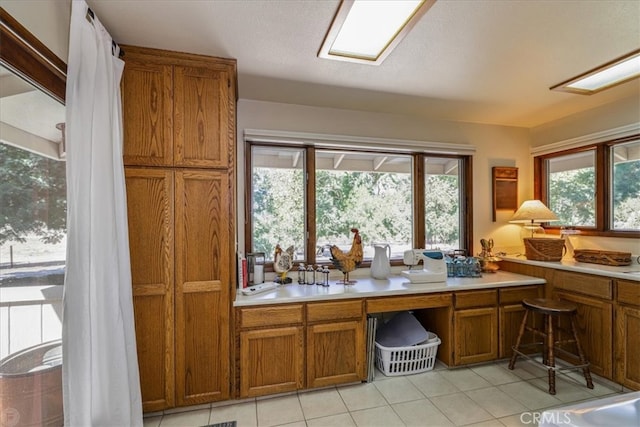 kitchen with light tile patterned floors