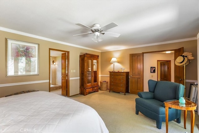 bedroom featuring ceiling fan, light colored carpet, and ornamental molding