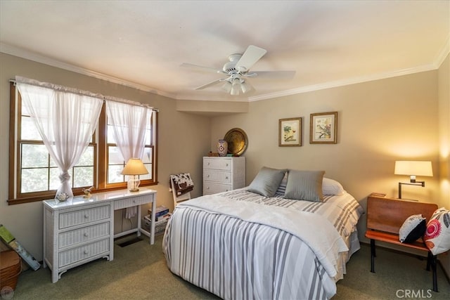 bedroom with ceiling fan, carpet floors, and ornamental molding