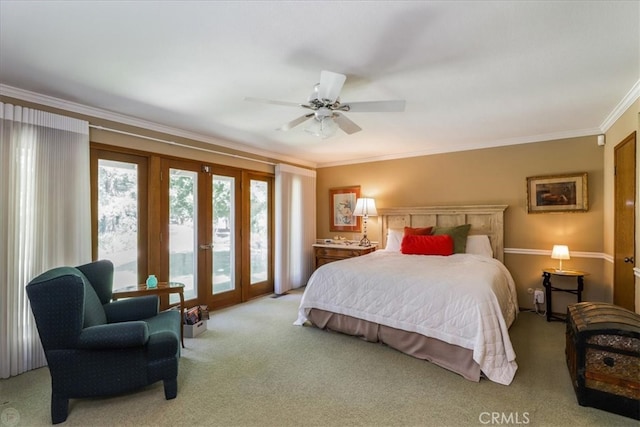 carpeted bedroom with ceiling fan, french doors, crown molding, and access to exterior