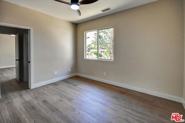 spare room with ceiling fan and light hardwood / wood-style floors