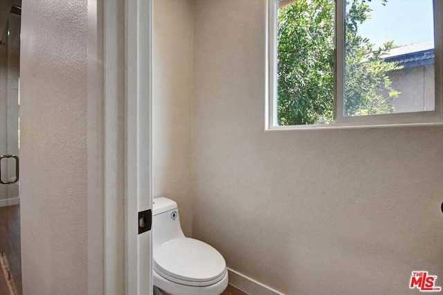 bathroom featuring toilet