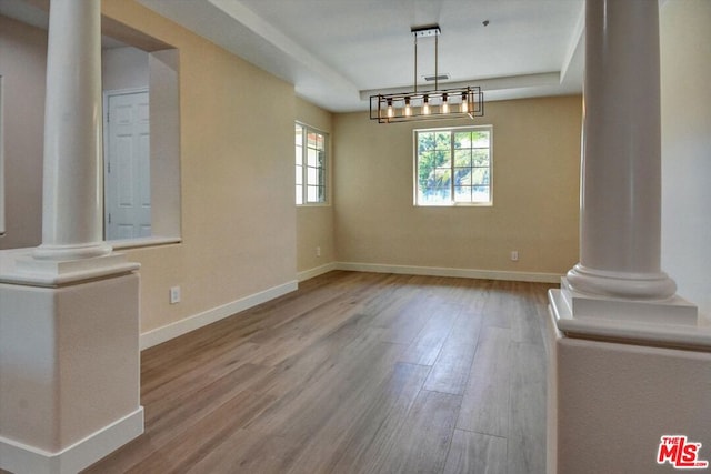 unfurnished dining area with light hardwood / wood-style flooring