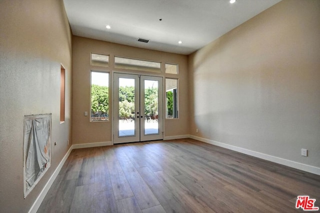 doorway featuring french doors and hardwood / wood-style flooring