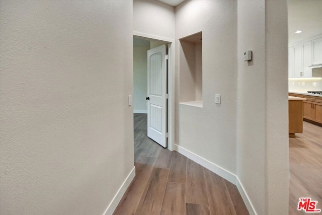 hall featuring light wood-type flooring