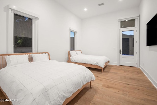 bedroom featuring light hardwood / wood-style floors