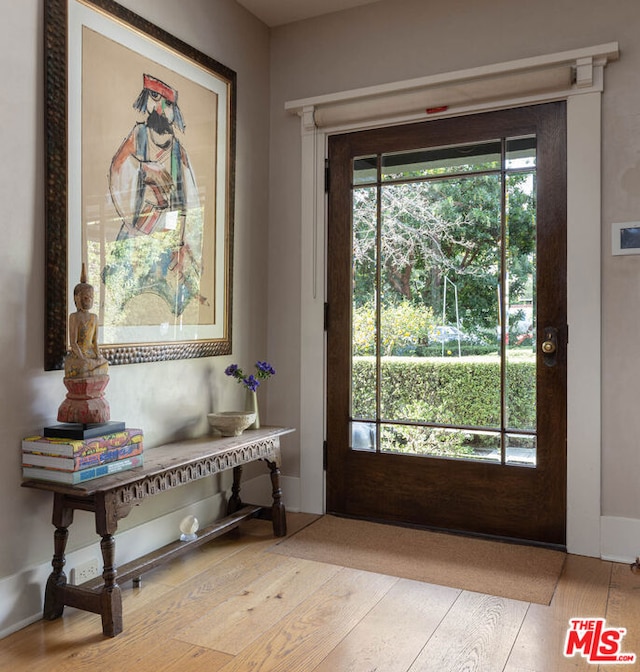 entryway with light wood-type flooring