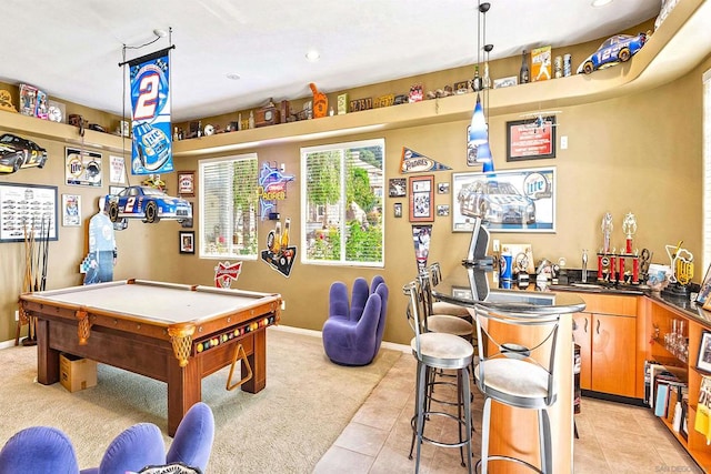 recreation room featuring indoor bar, billiards, and light tile patterned floors