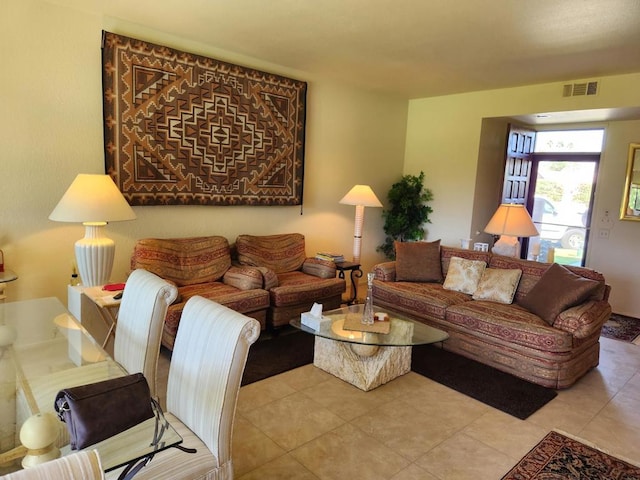 living room featuring light tile patterned flooring