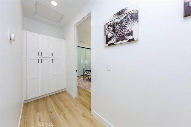 hall featuring light hardwood / wood-style flooring