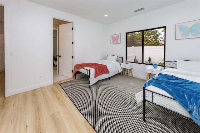 bedroom featuring hardwood / wood-style flooring