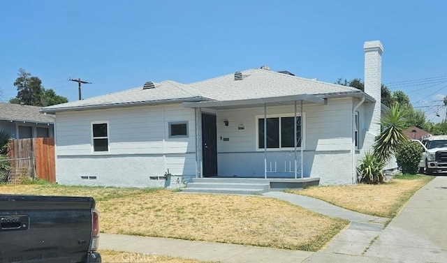 view of front of house with a front lawn