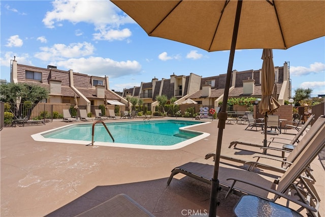 view of swimming pool featuring a patio area