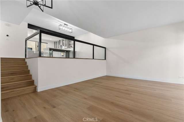 empty room featuring wood-type flooring