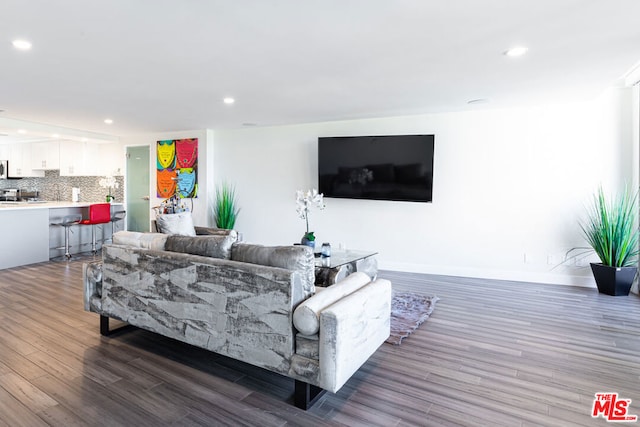 living room featuring dark hardwood / wood-style floors