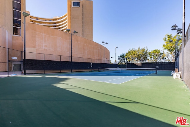 view of tennis court with basketball court