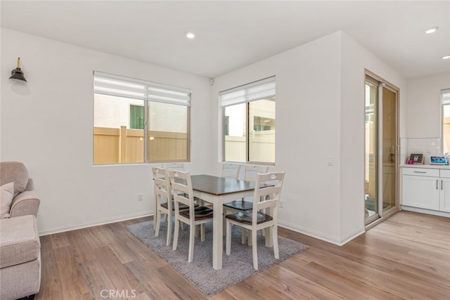 dining room featuring light hardwood / wood-style floors