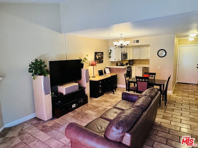 living room featuring a chandelier